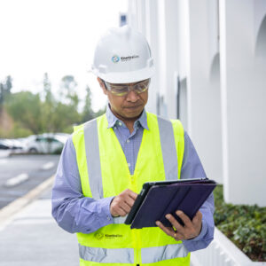 utility worker with tablet